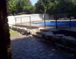 backyard-patio-by-zylstra-with-natural-stone-wall