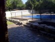 backyard-patio-by-zylstra-with-natural-stone-wall
